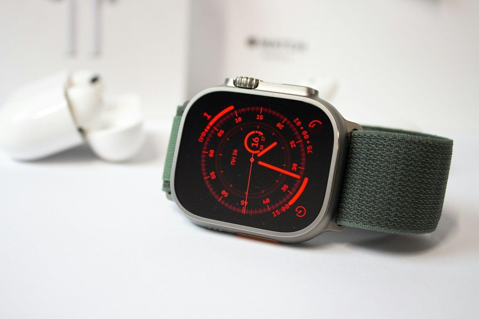a watch on a white surface